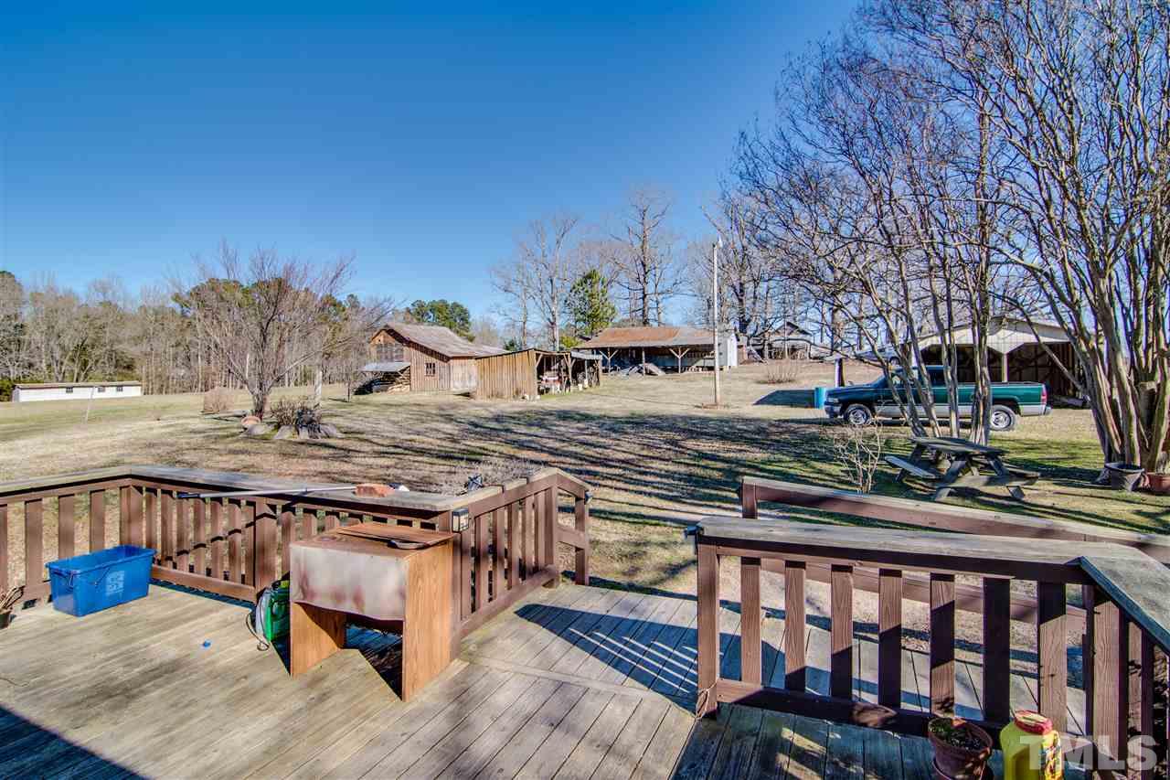 7121 Blalock Road Bahama, NC 27503 - Photo 14 of 17 a view of a chairs on the deck