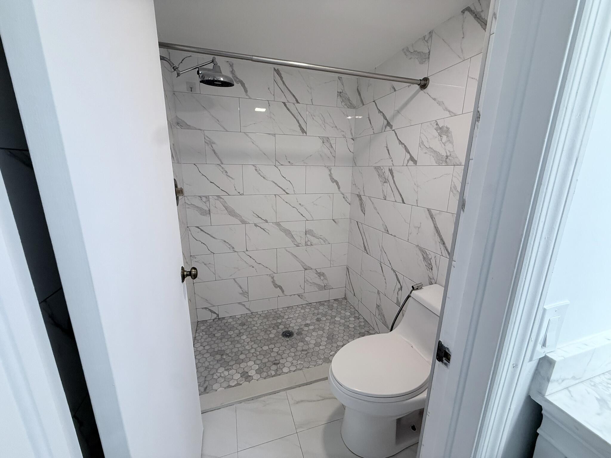 300 East Club Circle, Unit 107 Boca Raton, FL 33487 - Photo 9 of 16 Master bath shower