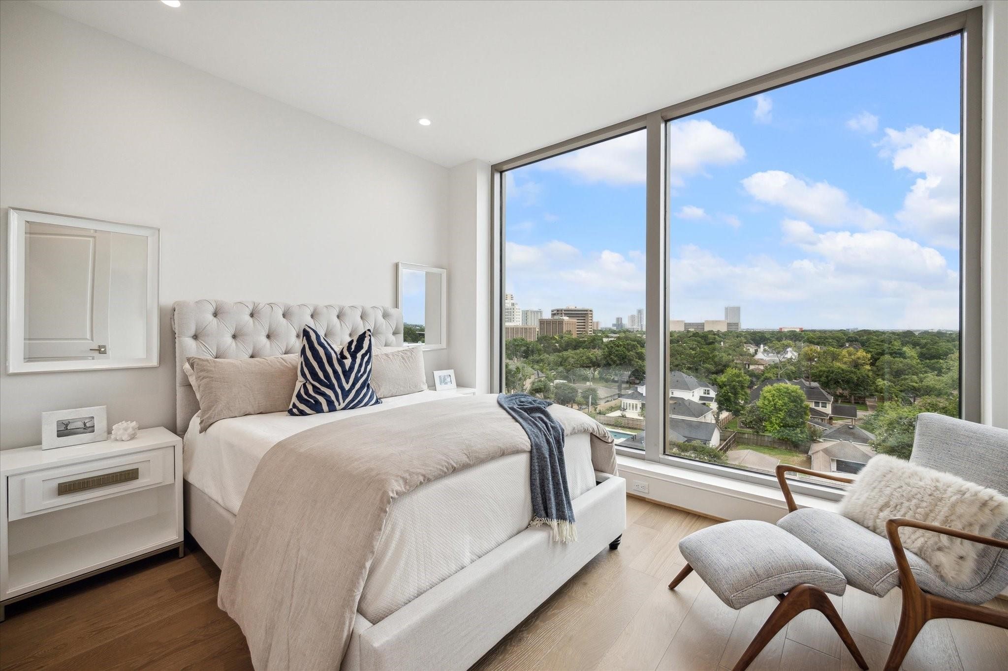 5656 San Felipe Street, Unit 601 Houston, TX 77056 - Photo 41 of 45 En-suite bedroom with floor-to-ceiling windows. Photos are of a similar unit with the same floor plan
