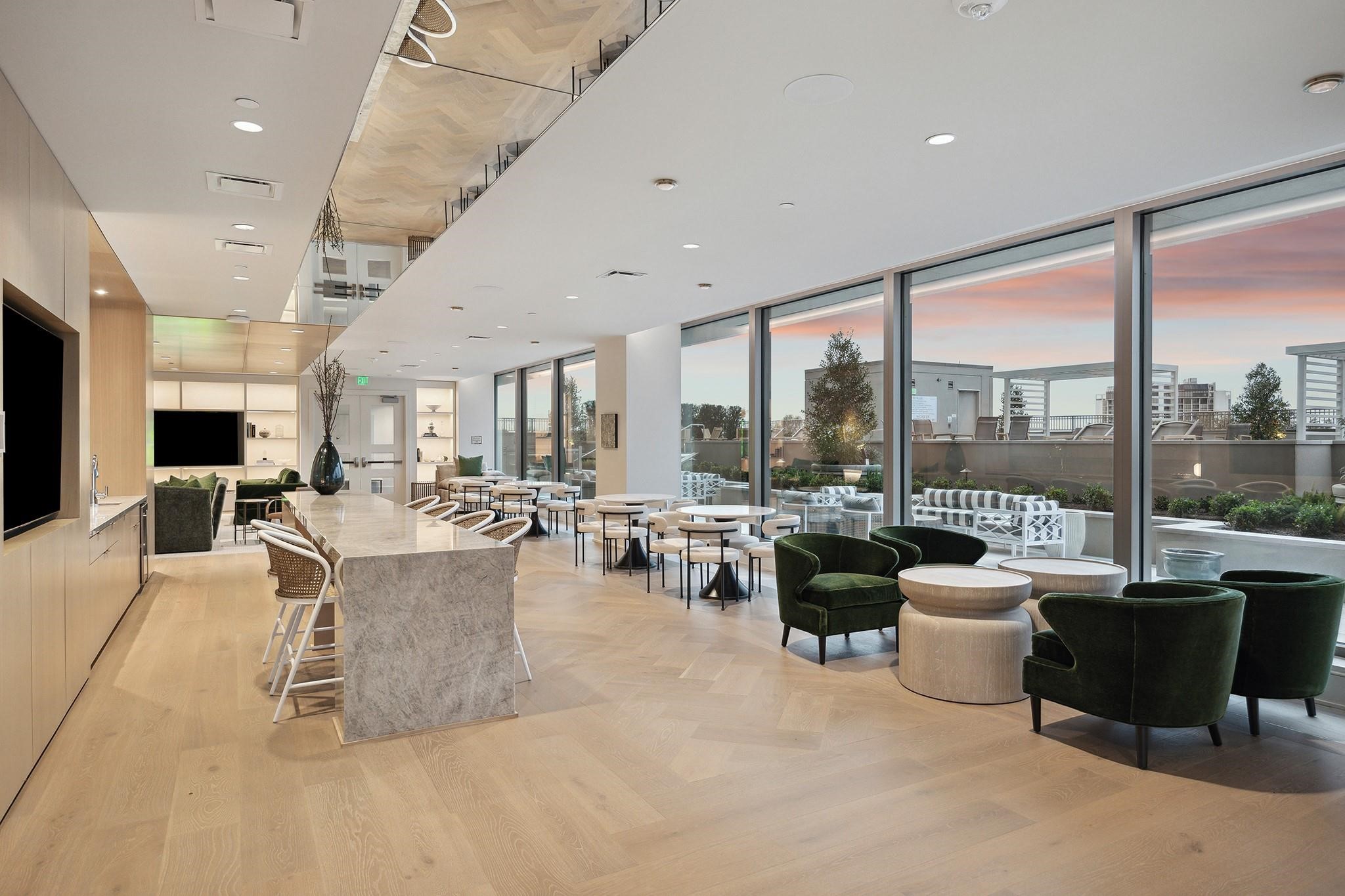 5656 San Felipe Street, Unit 601 Houston, TX 77056 - Photo 11 of 45 Retreat to the fifth-floor resident lounge, where multiple comfortable seating and dining areas open to the spectacular pool deck.