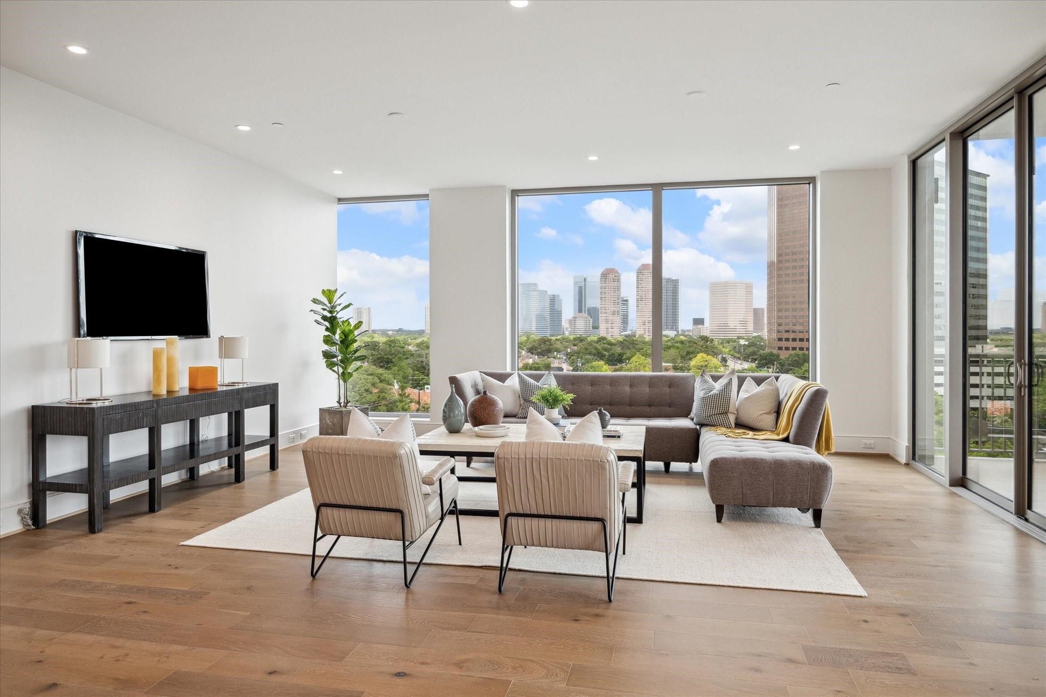 5656 San Felipe Street, Unit 601 Houston, TX 77056 - Photo 22 of 45 A private balcony just beyond the glass doors offers a serene spot to take in the views and unwind. Photos are of a similar unit with the same floor plan