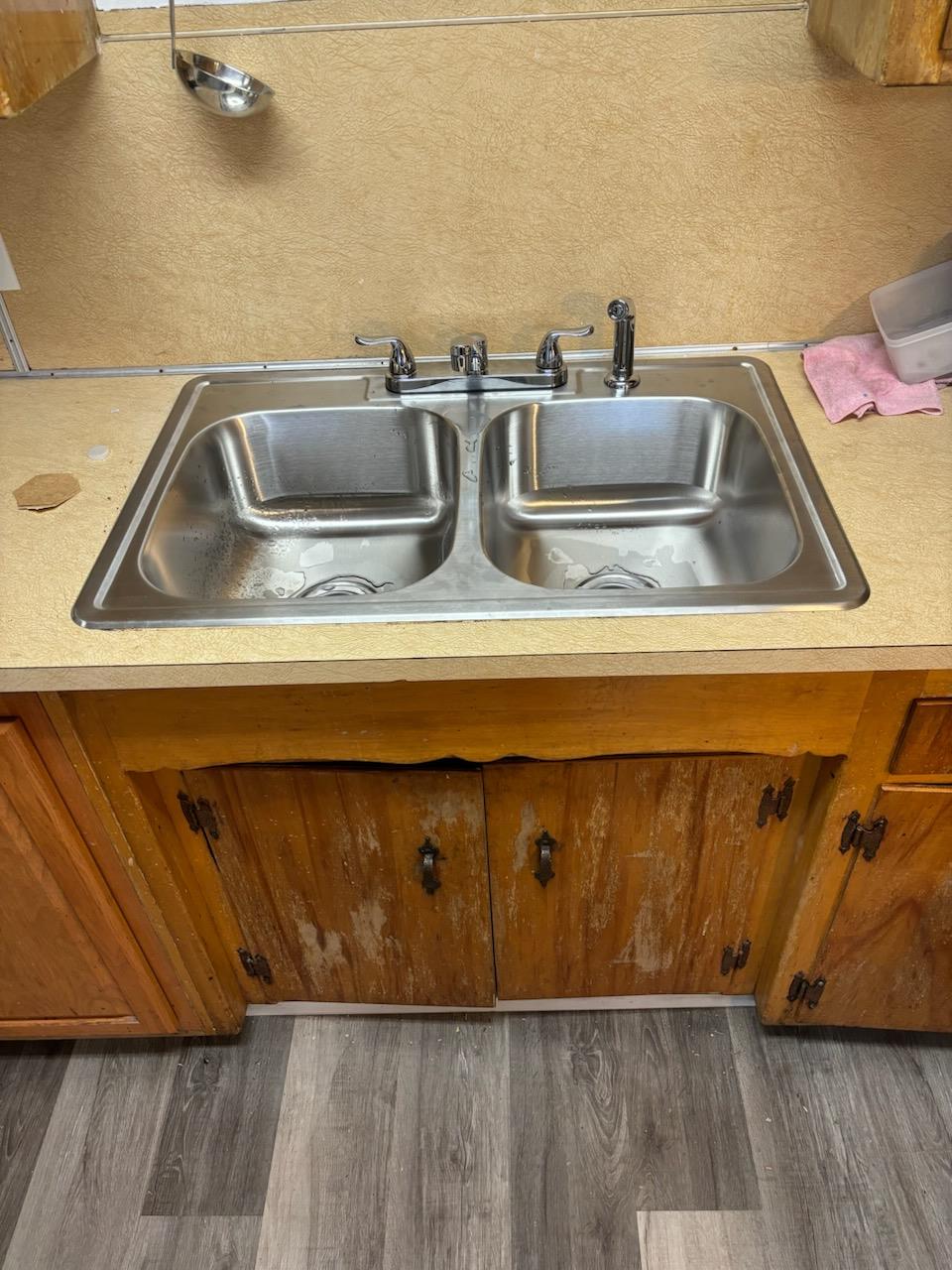 229 E Street Los Banos, CA 93635 - Photo 9 of 9 a close view of sink and tap