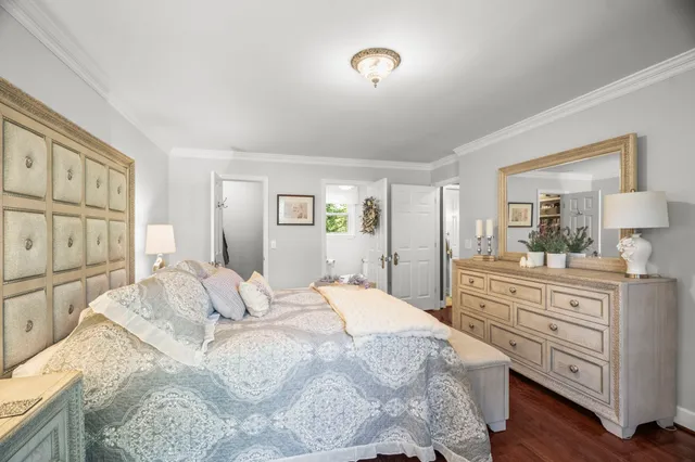 a bathroom with a granite countertop sink a mirror and a vanity