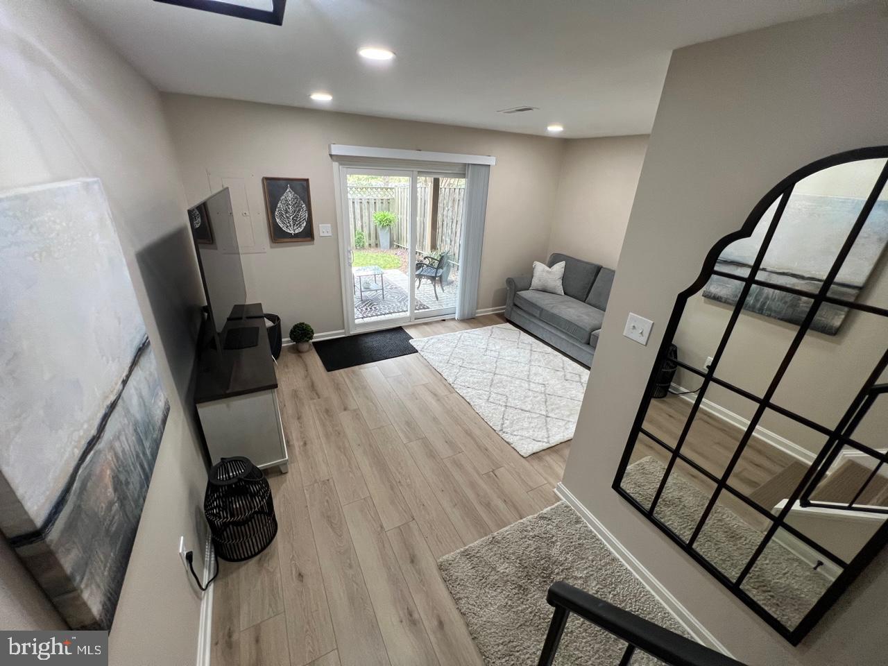 20202 Foothill Terrace Ashburn, VA 20147 - Photo 22 of 26 a bedroom with furniture and a window