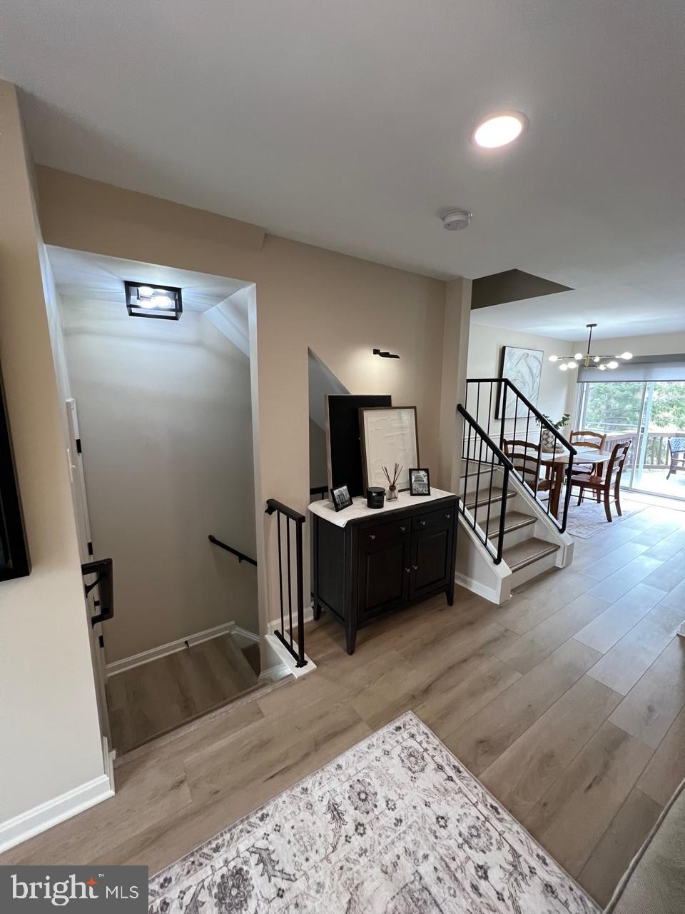 20202 Foothill Terrace Ashburn, VA 20147 - Photo 3 of 26 a living room with furniture and a flat screen tv