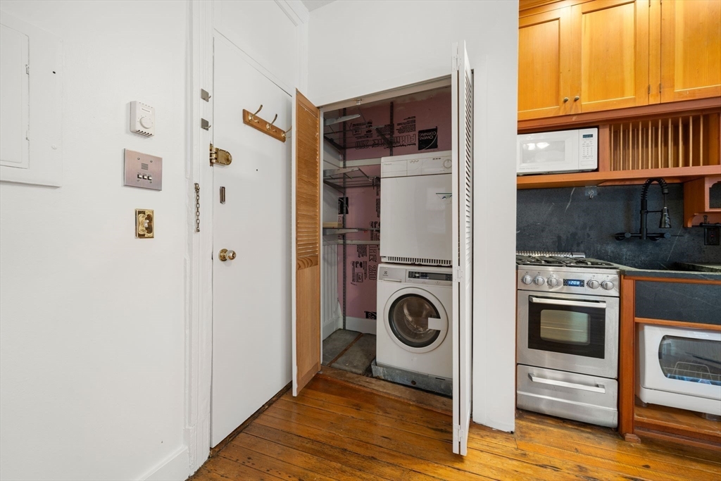 7 Unity Street, Unit 3 Boston, MA 02113 - Photo 9 of 25 a view of kitchen and utility room