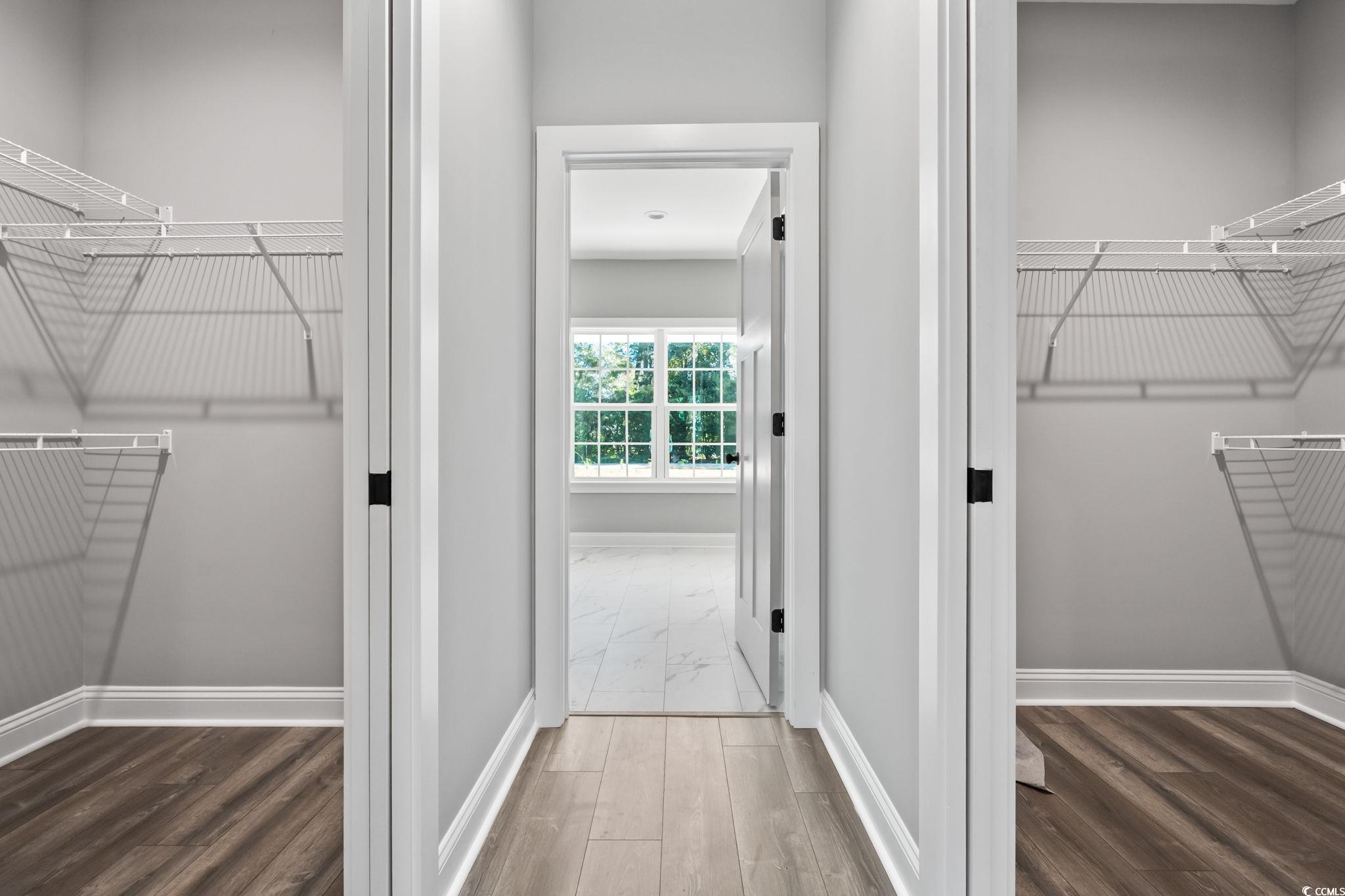 2122 Highway 9 Business Loris, SC 29569 - Photo 22 of 32 Spacious closet featuring dark wood finished floors