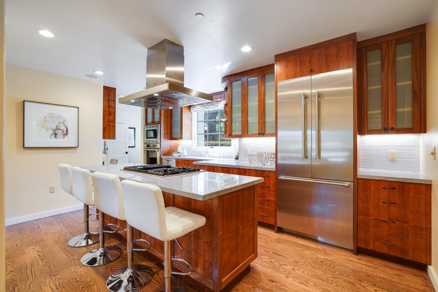 472 Edgewood Road San Mateo, CA 94402 - Photo 21 of 77 a kitchen with stainless steel appliances granite countertop a sink and a refrigerator
