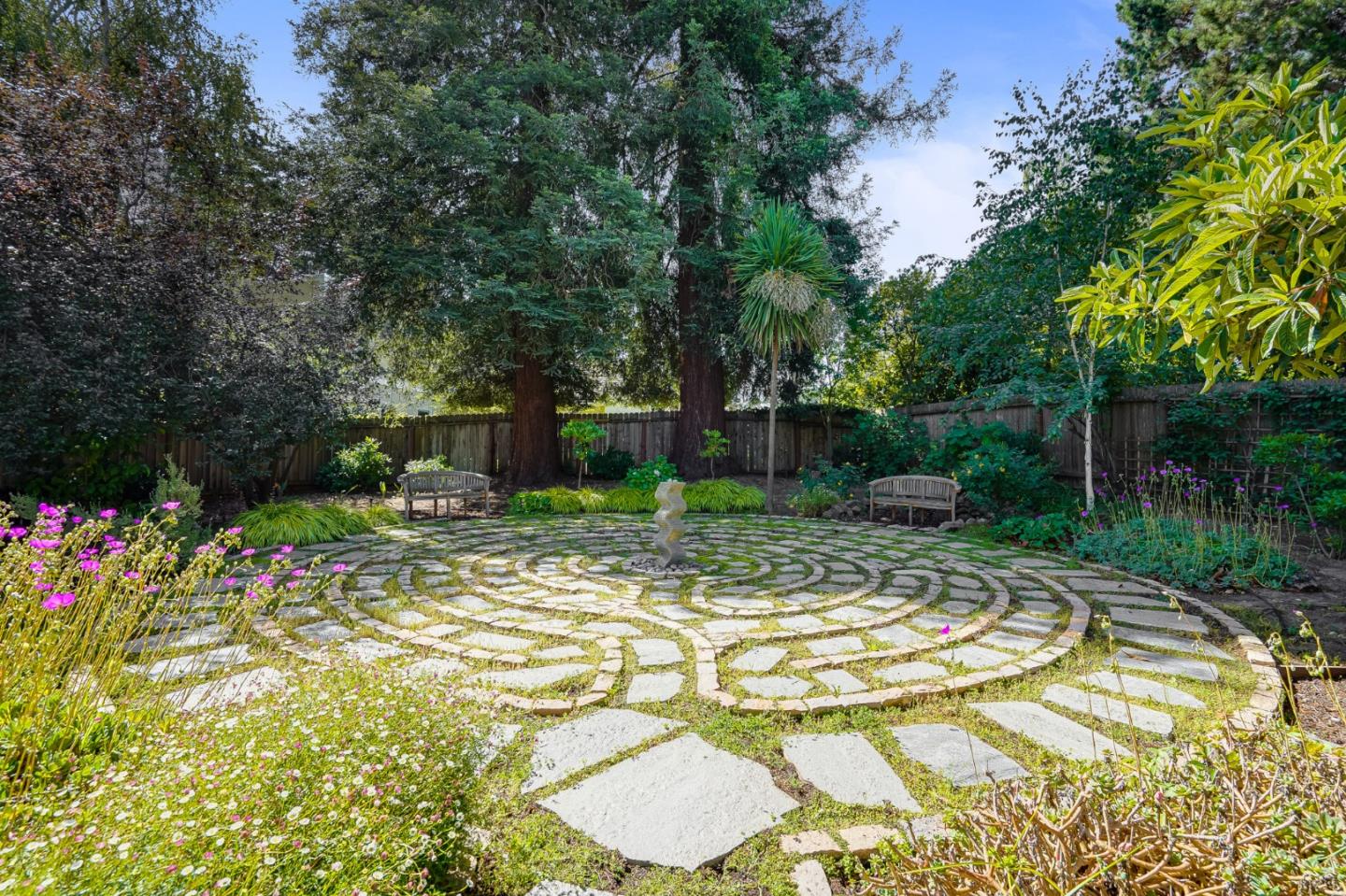 472 Edgewood Road San Mateo, CA 94402 - Photo 61 of 77 a view of a chair and table in the garden