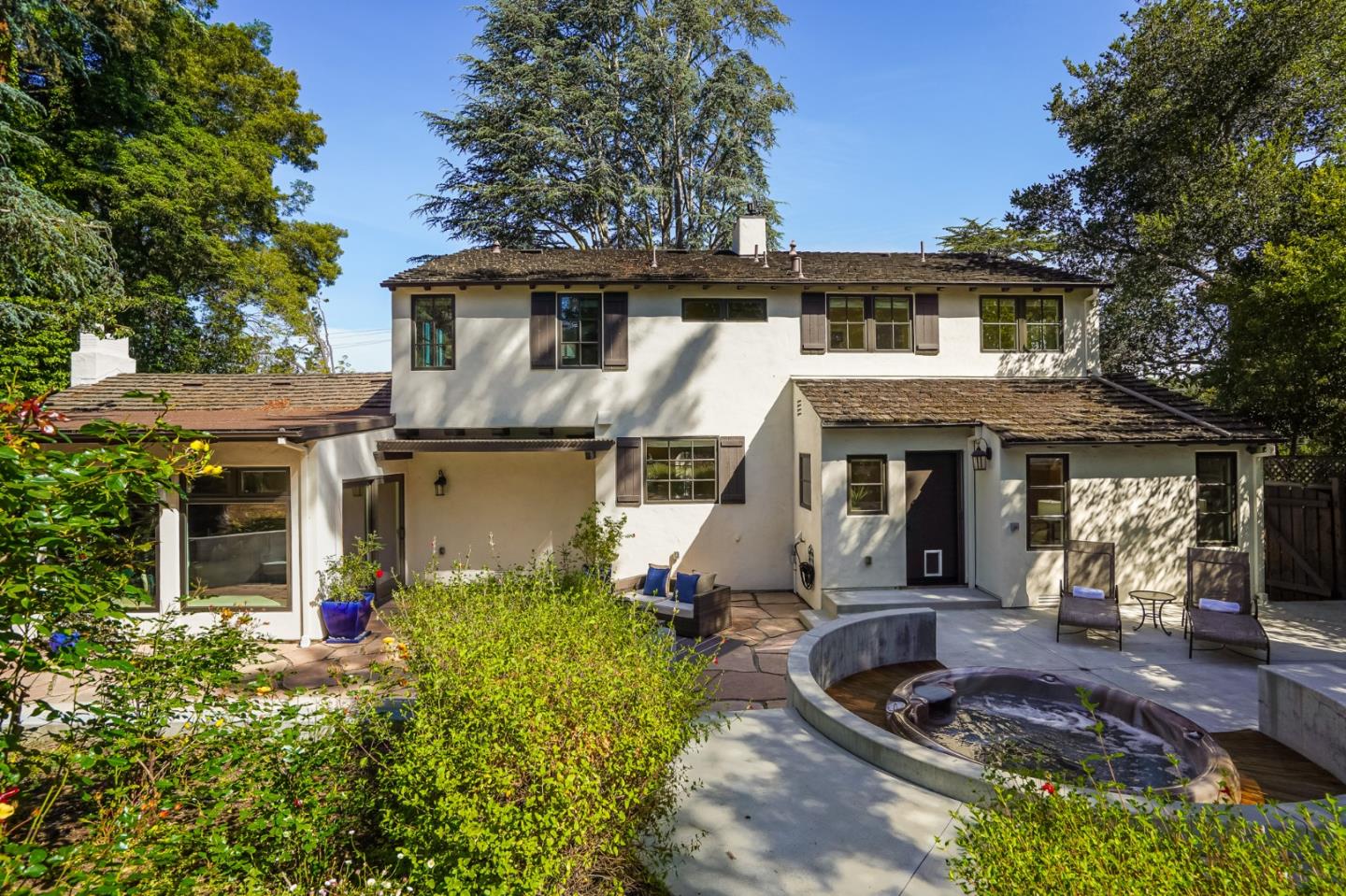 472 Edgewood Road San Mateo, CA 94402 - Photo 62 of 77 a front view of a house with porch yard and outdoor seating