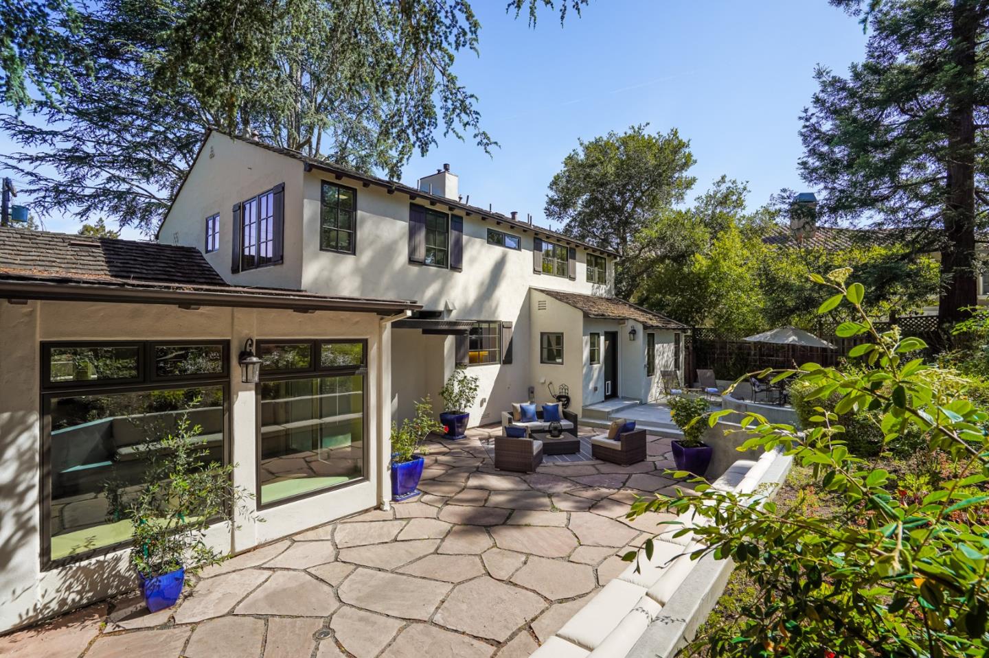 472 Edgewood Road San Mateo, CA 94402 - Photo 66 of 77 a view of a house with backyard porch and sitting area