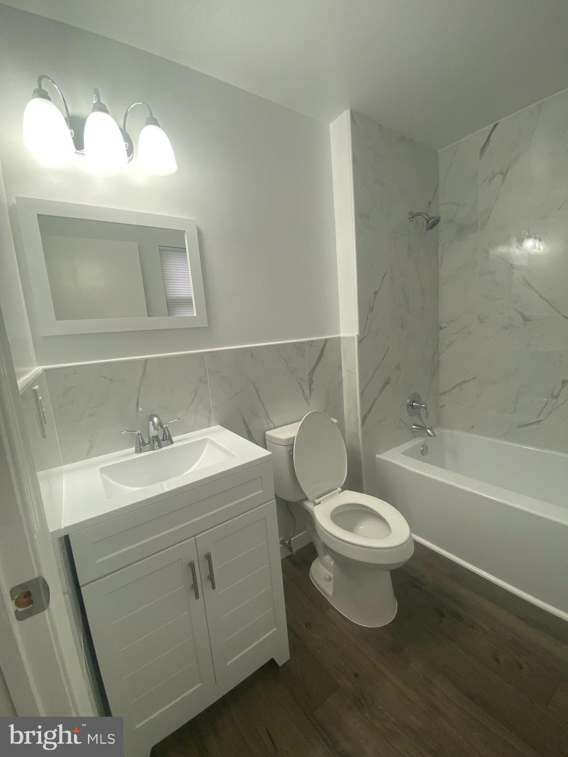 532 Cormorant Drive Voorhees, NJ 08043 - Photo 16 of 28 a bathroom with a toilet a sink a mirror and bathtub