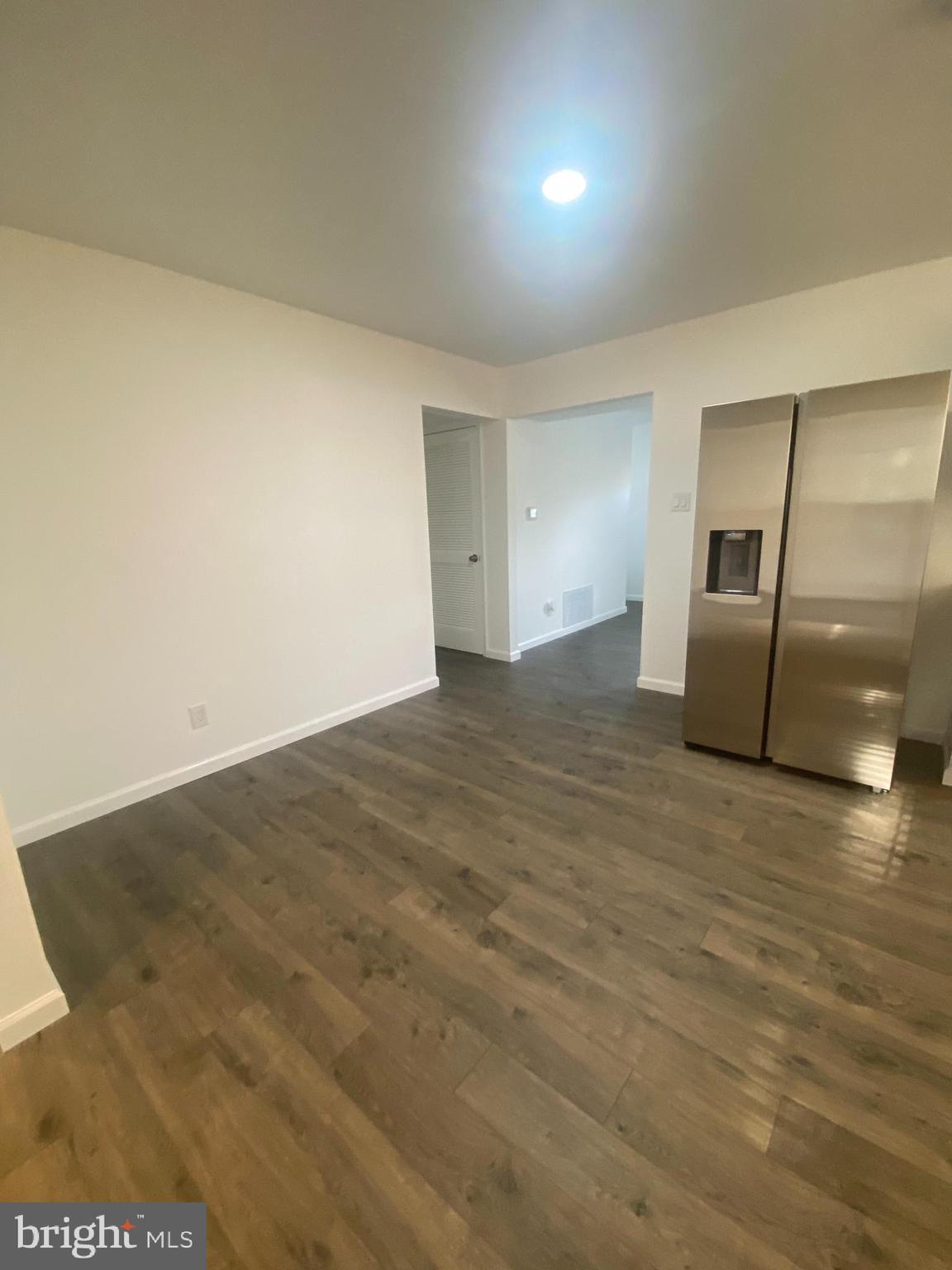 532 Cormorant Drive Voorhees, NJ 08043 - Photo 8 of 28 an empty room with wooden floor and windows