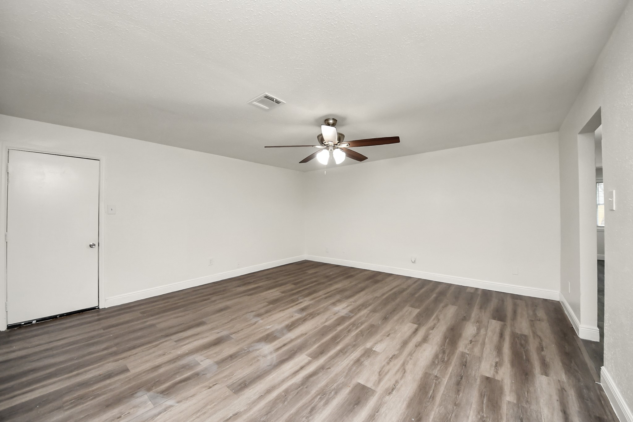 1139 Hartwick Road Houston, TX 77037 - Photo 16 of 38 wooden floor in an empty room