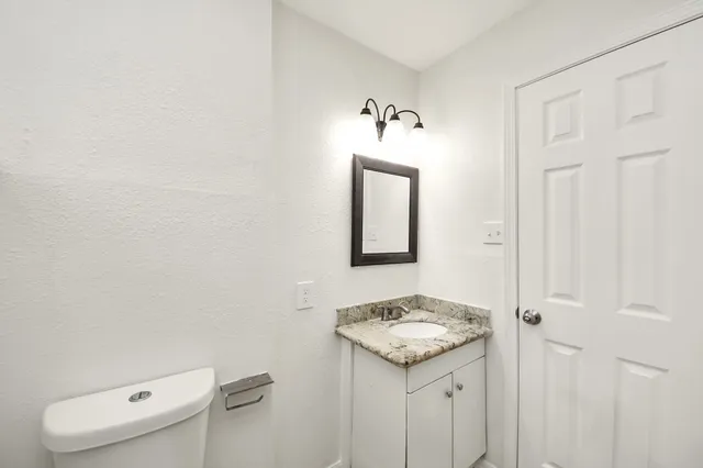 a bathroom with a sink and a toilet