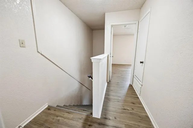 an aerial view of a house with swimming pool