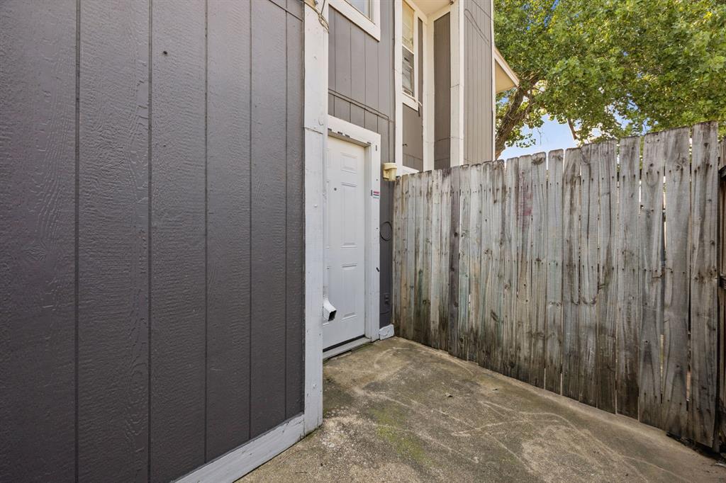 7504 Chapin Road Fort Worth, TX 76116 - Photo 24 of 30 a view of a house with a wooden fence