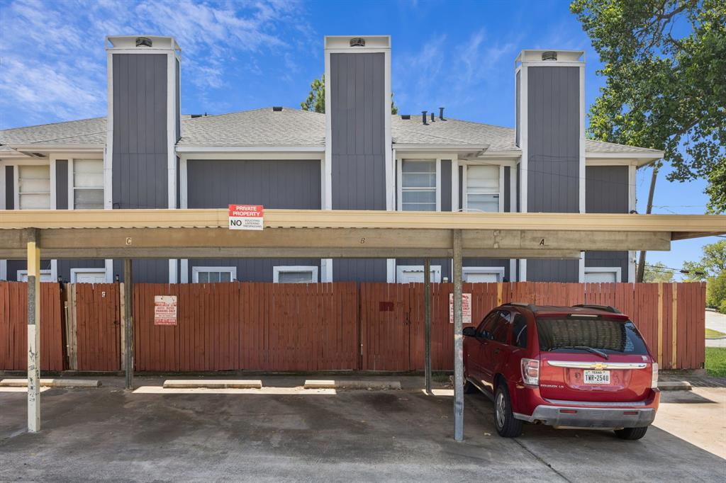 7504 Chapin Road Fort Worth, TX 76116 - Photo 26 of 30 a front view of a building with parking space