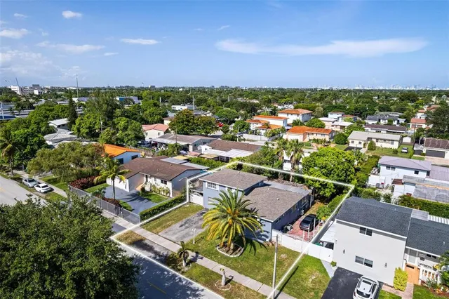 an aerial view of a house with a outdoor space