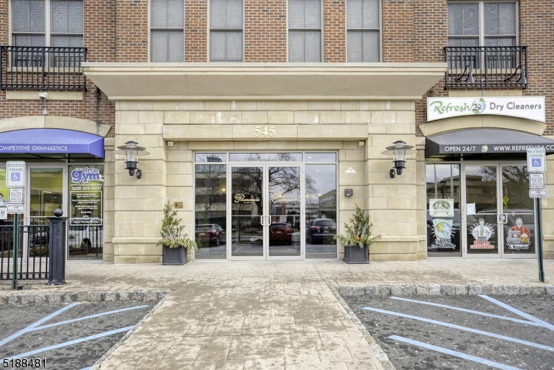 545 Morris Avenue, Unit 219 Summit, NJ 07901 - Photo 7 of 8 a view of a building with a outdoor space