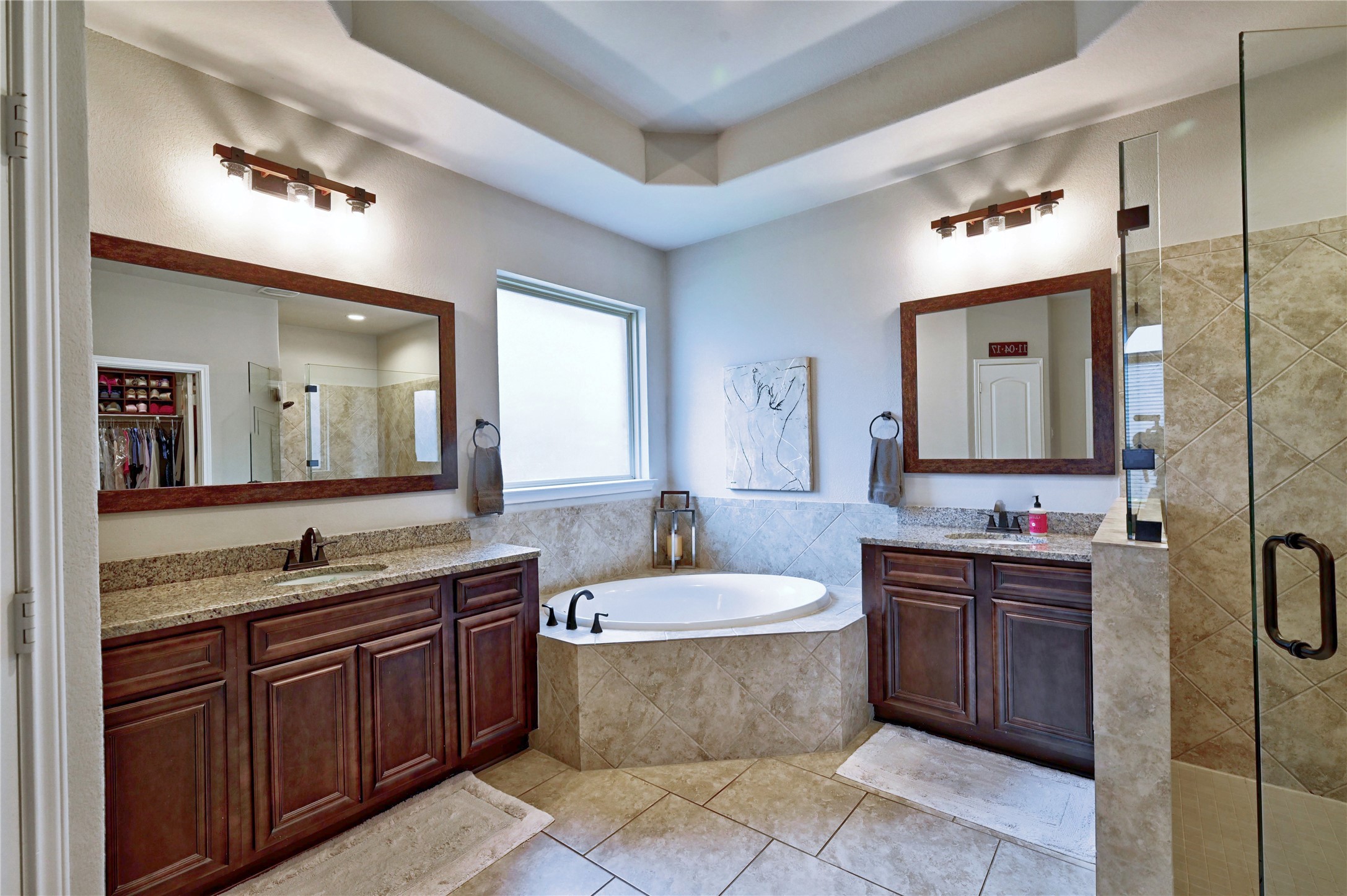 23118 Southern Brk Trail Spring, TX 77389 - Photo 28 of 50 Updated wood trim was also added to the mirrors. The ceiling in the bath is recessed.