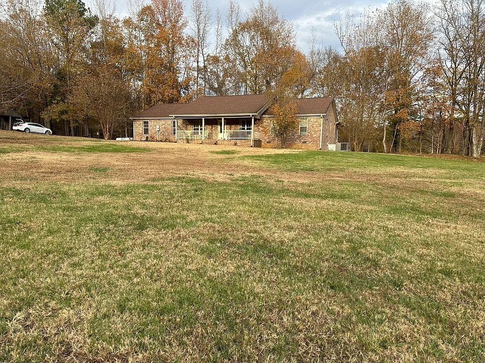201 Swink Road Medon, TN 38356 - Photo 1 of 2 a front view of house with yard