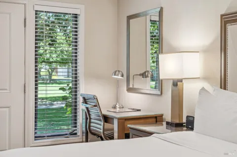 a room with furniture and a window