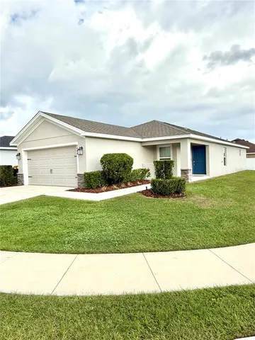 a black and white photo of a house