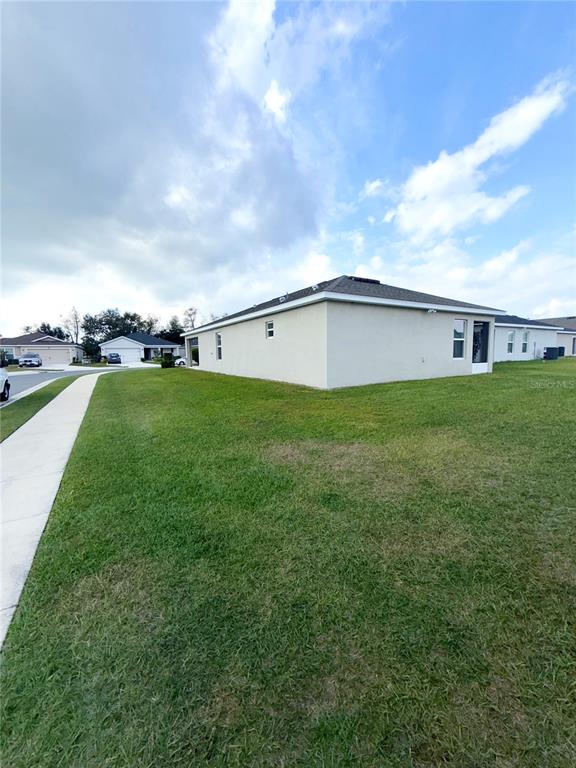 4448 Reding Way Lakeland, FL 33813 - Photo 26 of 26 a view of a backyard of the house