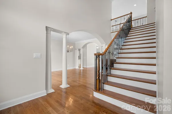 a view of entryway with wooden floor