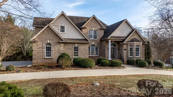 a front view of a house with a glass door