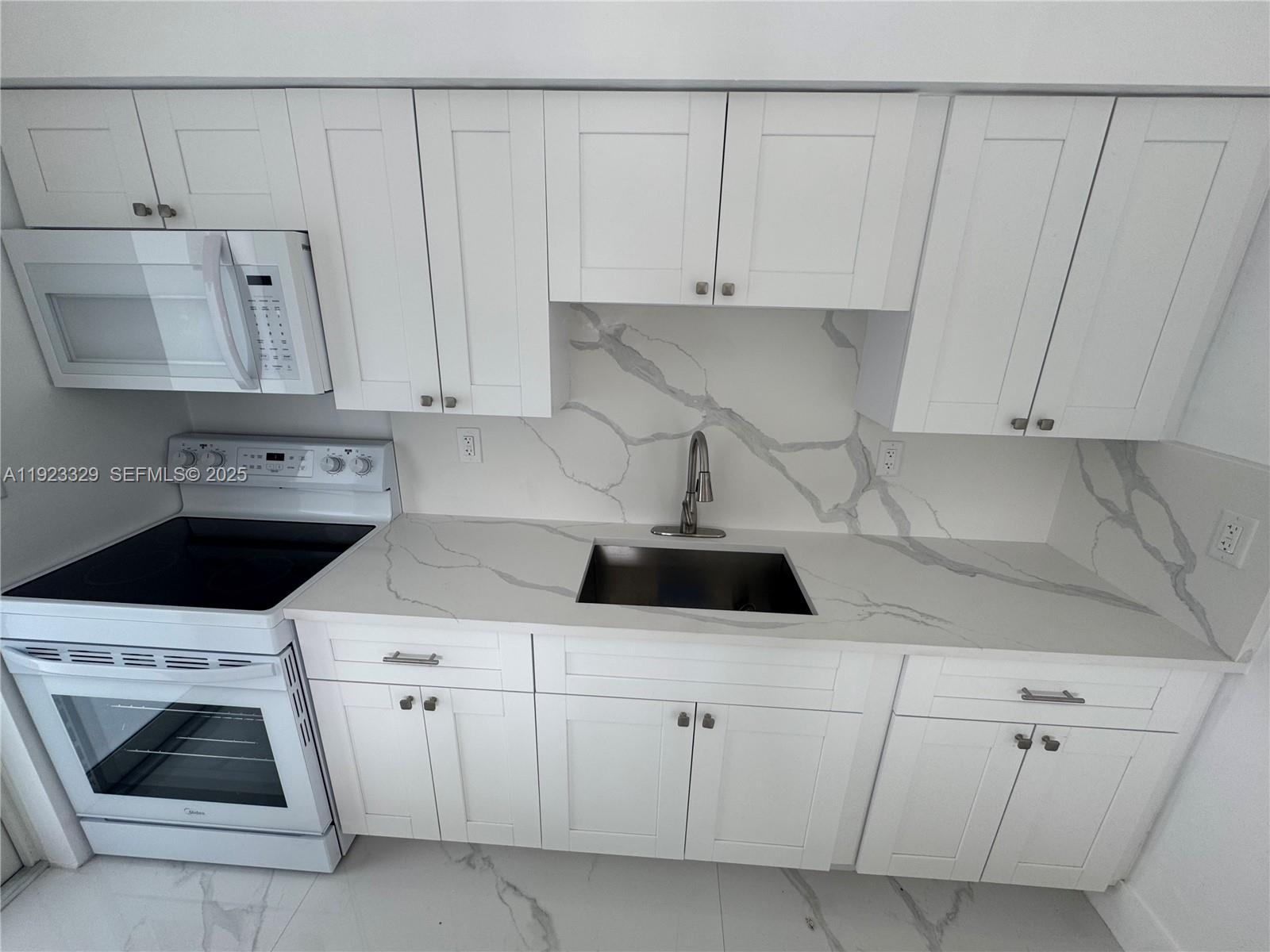 801 Northwest 109th Street, Unit 1 Miami, FL 33168 - Photo 5 of 9