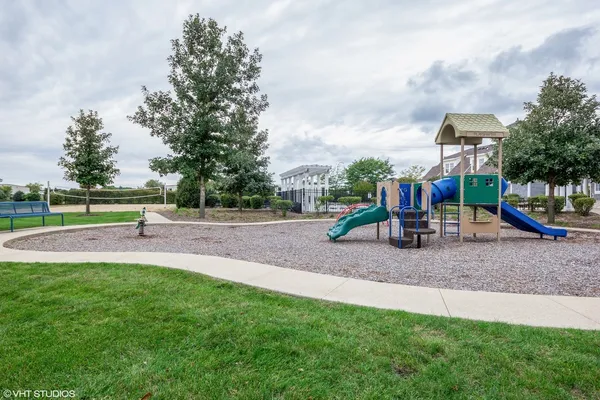 a view of an outdoor space and tennis court
