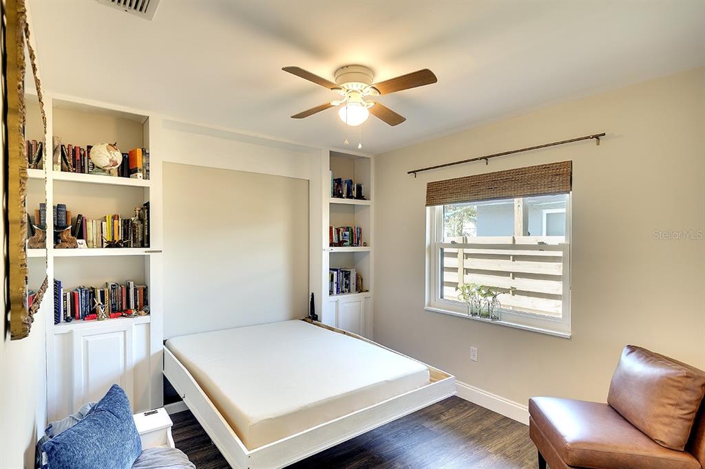 2224 Eugene Street Sarasota, FL 34231 - Photo 21 of 45 a workspace with furniture and a window