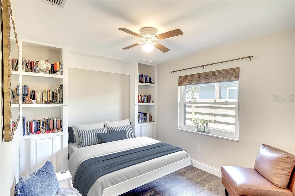 2224 Eugene Street Sarasota, FL 34231 - Photo 22 of 45 a bed room with a bed and a window