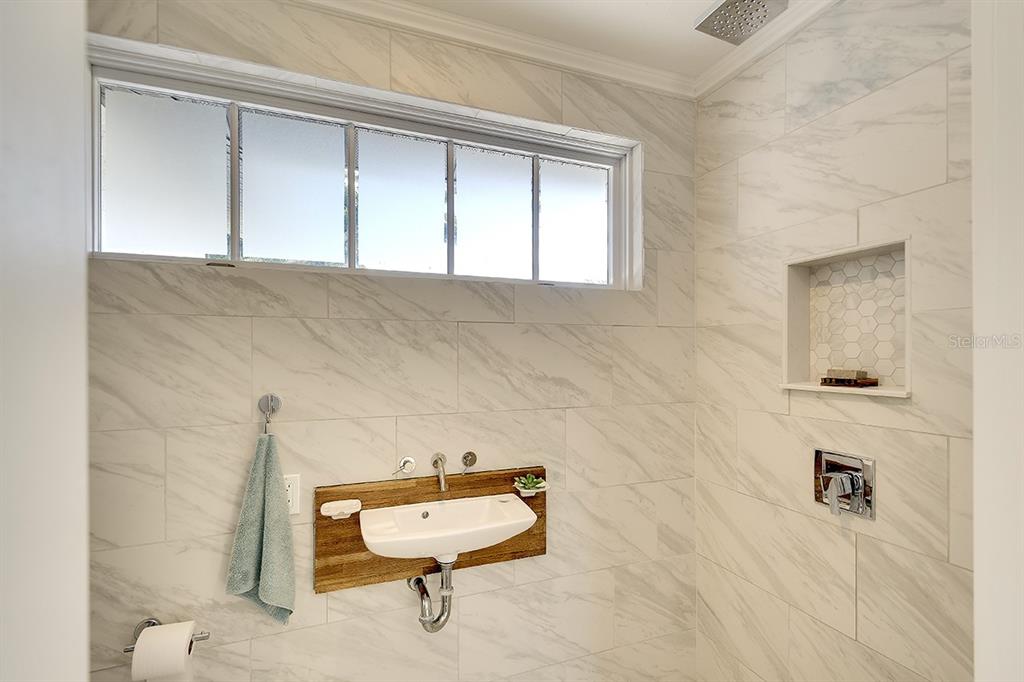 2224 Eugene Street Sarasota, FL 34231 - Photo 26 of 45 a bathroom with a toilet