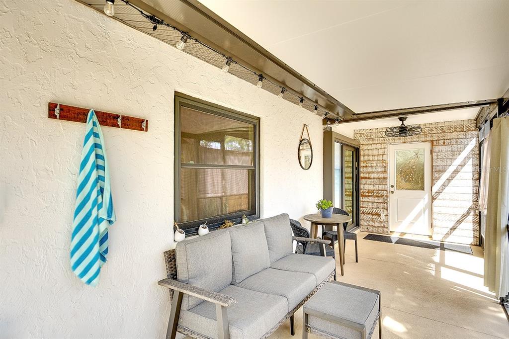 2224 Eugene Street Sarasota, FL 34231 - Photo 28 of 45 a living room with furniture and a window