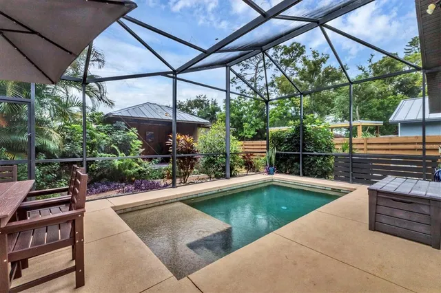 a view of swimming pool with a patio