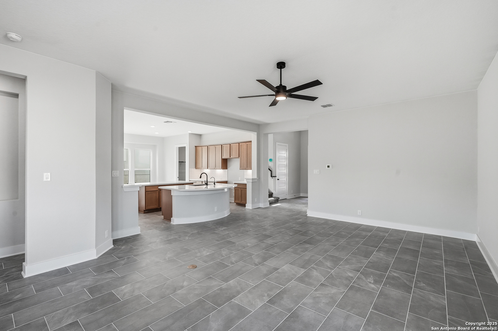 233 Sasparilla Boerne, TX 78006 - Photo 13 of 60 a view of a livingroom with kitchen and furniture