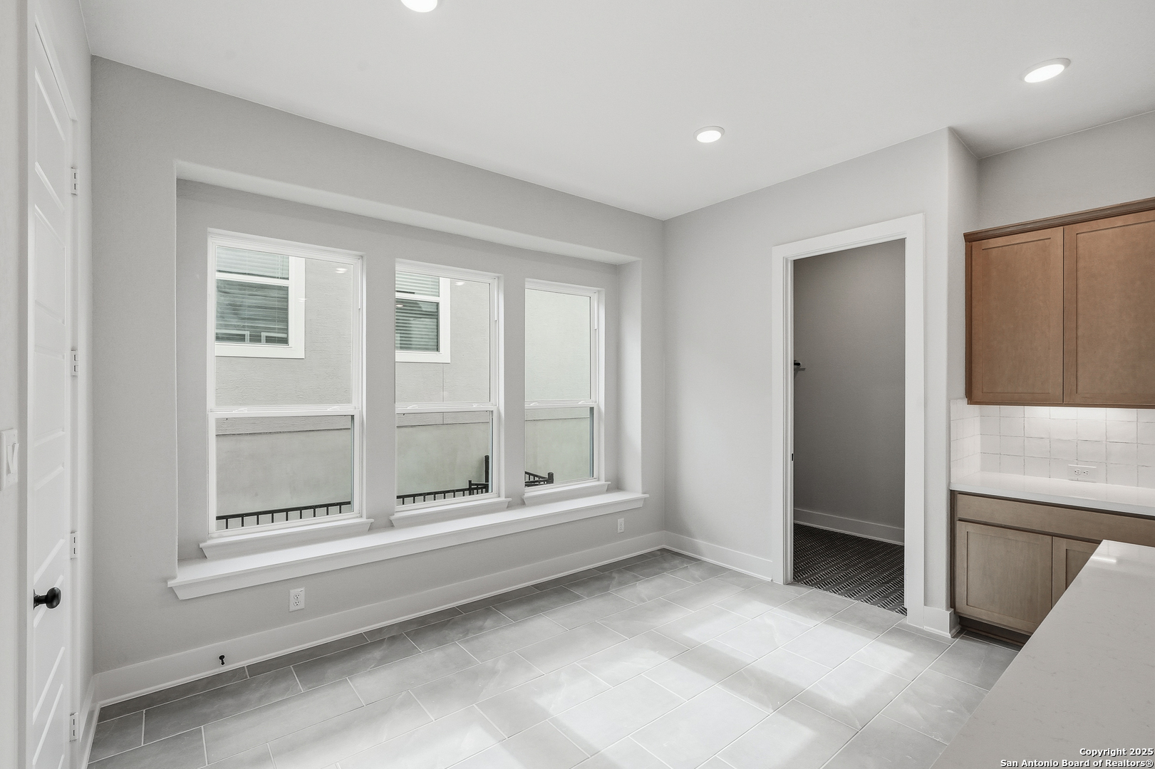 233 Sasparilla Boerne, TX 78006 - Photo 21 of 60 a view of an empty room with a window