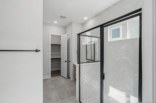 a view of a hallway with entryway