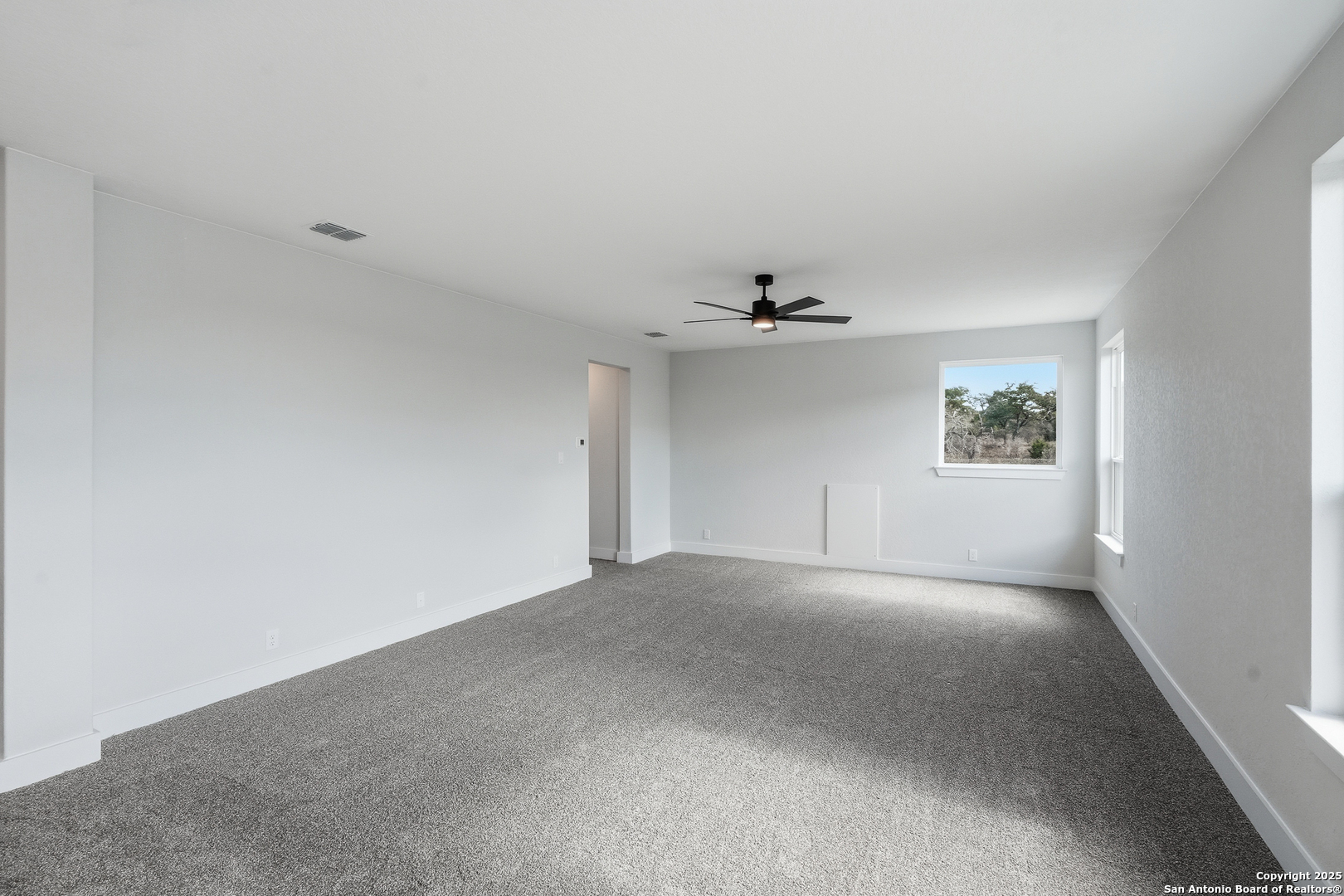 233 Sasparilla Boerne, TX 78006 - Photo 36 of 60 a view of an empty room with a window