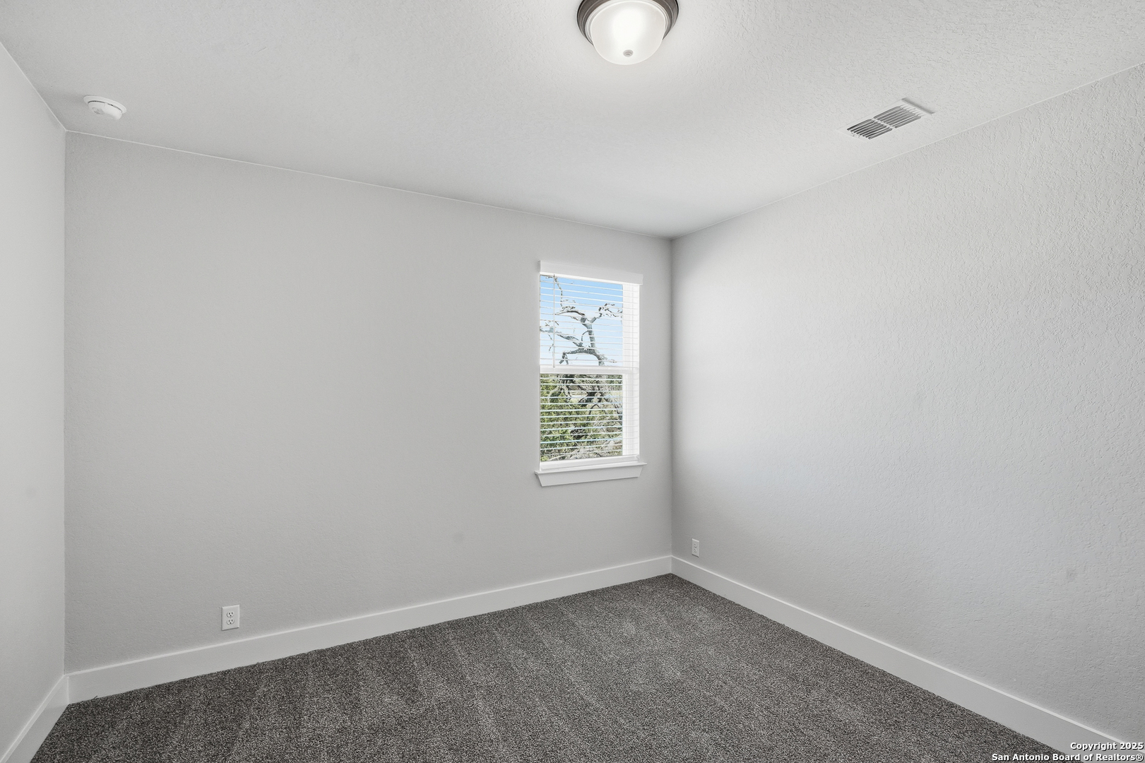 233 Sasparilla Boerne, TX 78006 - Photo 37 of 60 an empty room with a window