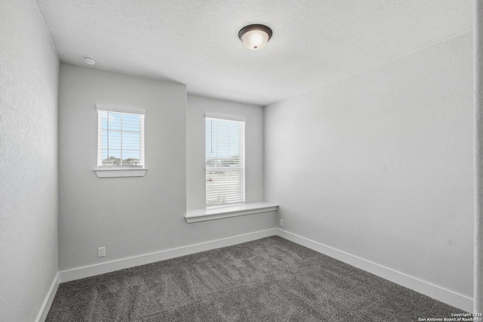 233 Sasparilla Boerne, TX 78006 - Photo 40 of 60 an empty room with a window