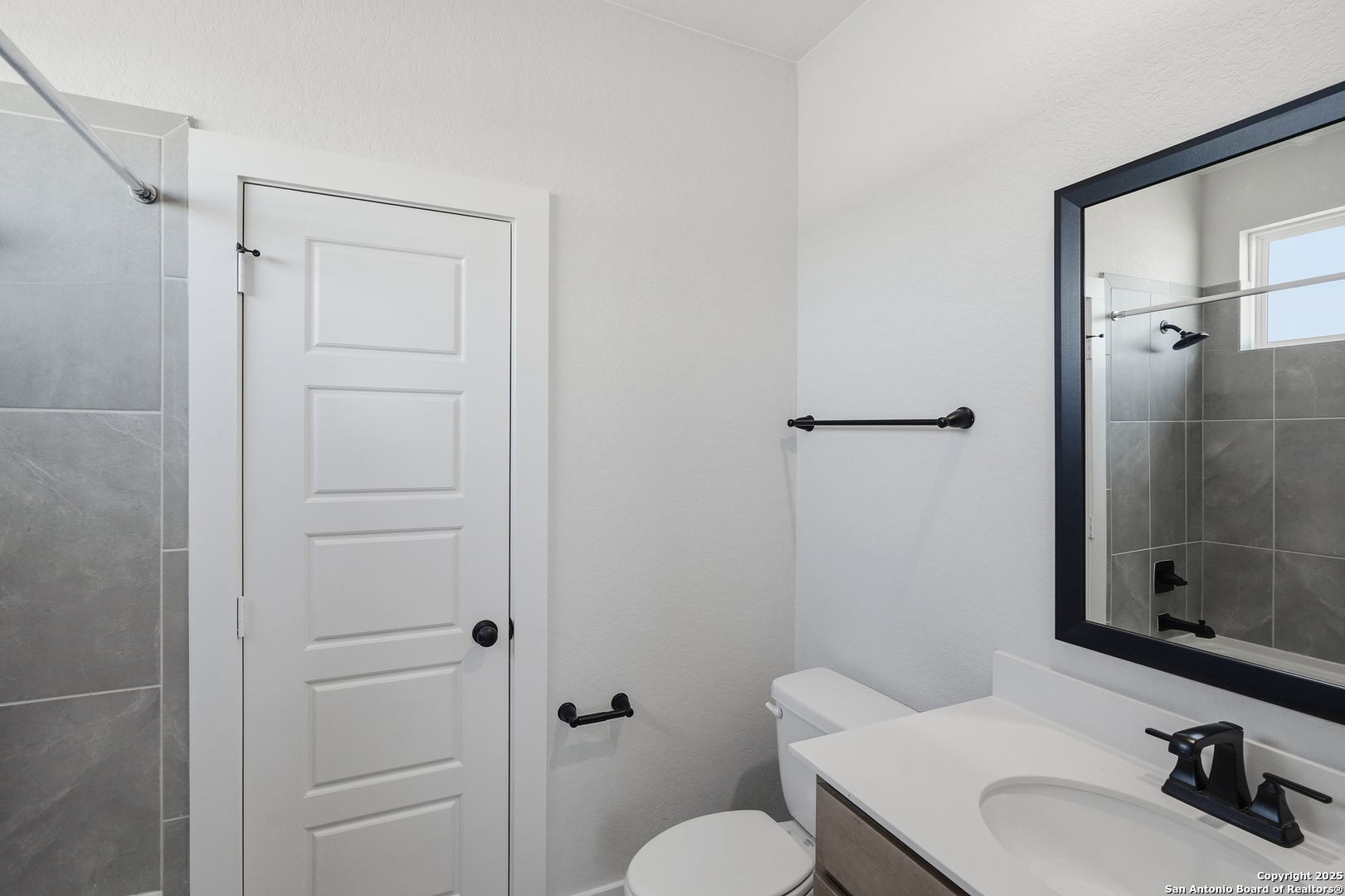 233 Sasparilla Boerne, TX 78006 - Photo 44 of 60 a bathroom with a sink a toilet and shower