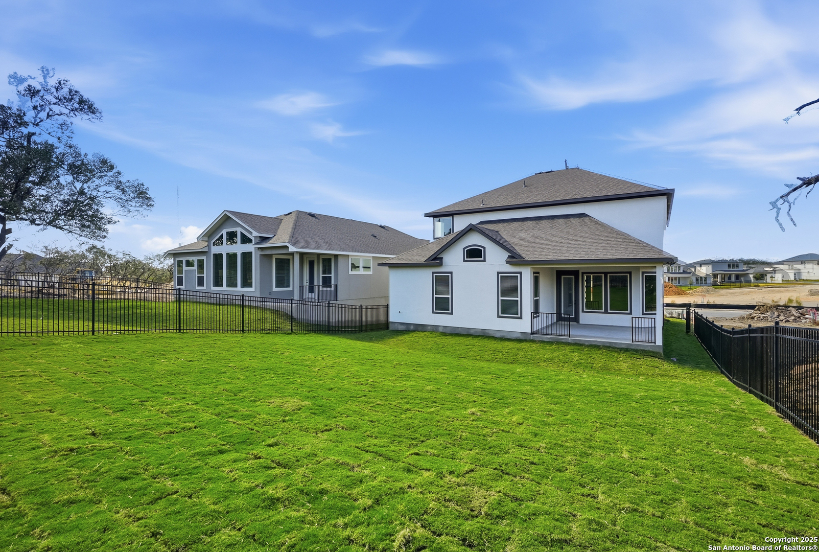 233 Sasparilla Boerne, TX 78006 - Photo 46 of 60 a front view of a house with garden