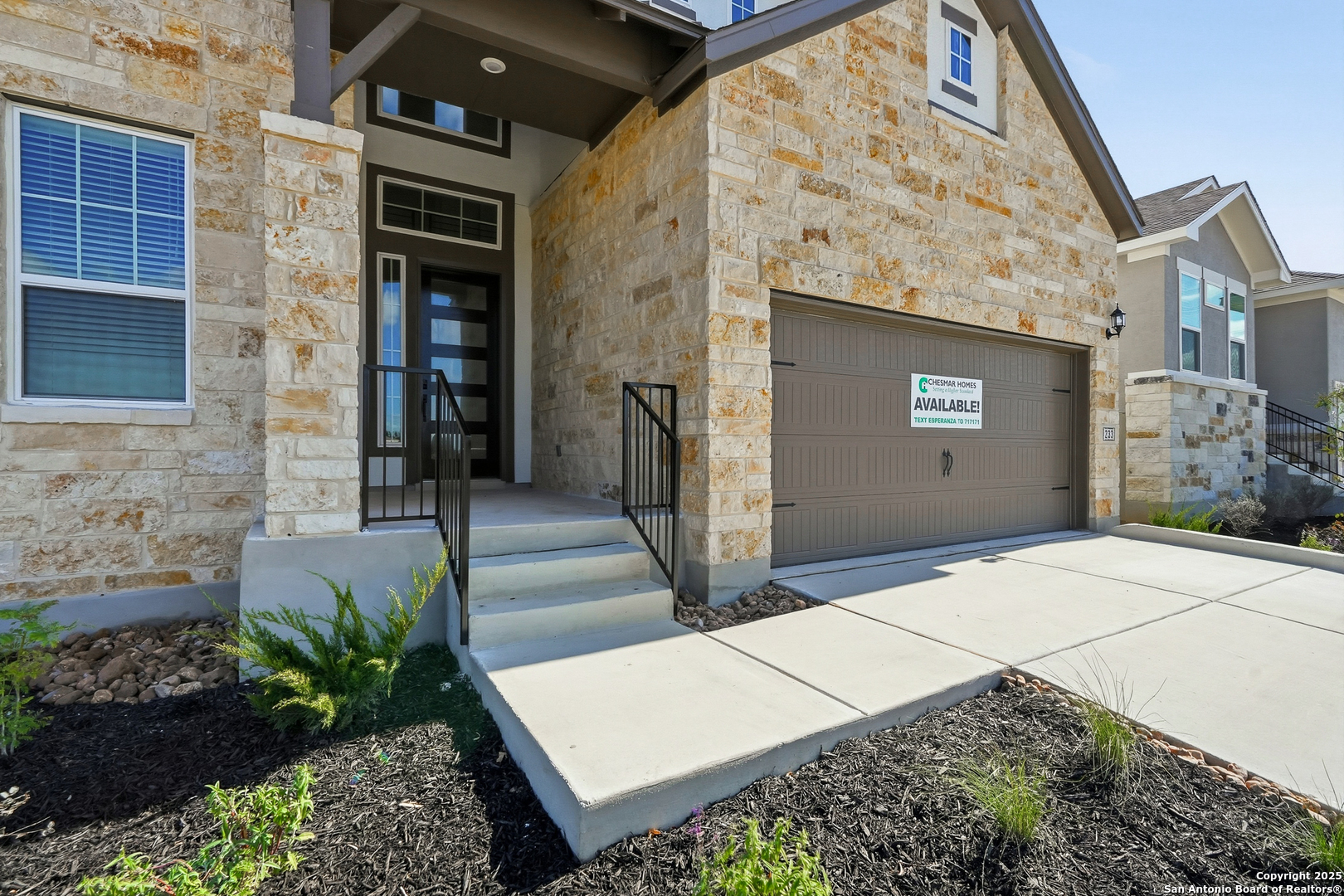 233 Sasparilla Boerne, TX 78006 - Photo 5 of 60 a view of a entryway door front of house