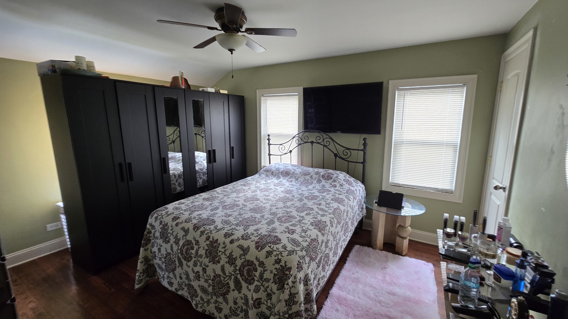 3352 West 84th Street Chicago, IL 60652 - Photo 11 of 26 a bedroom with a bed and wooden floor