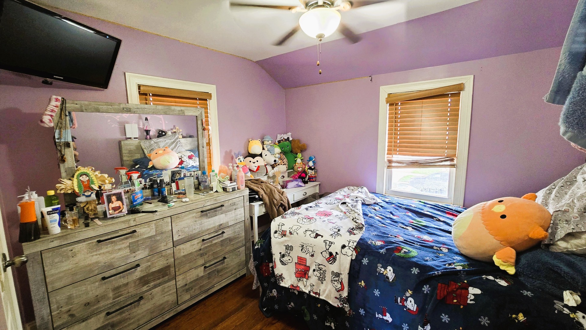 3352 West 84th Street Chicago, IL 60652 - Photo 12 of 26 a bedroom with a bed and flat screen tv