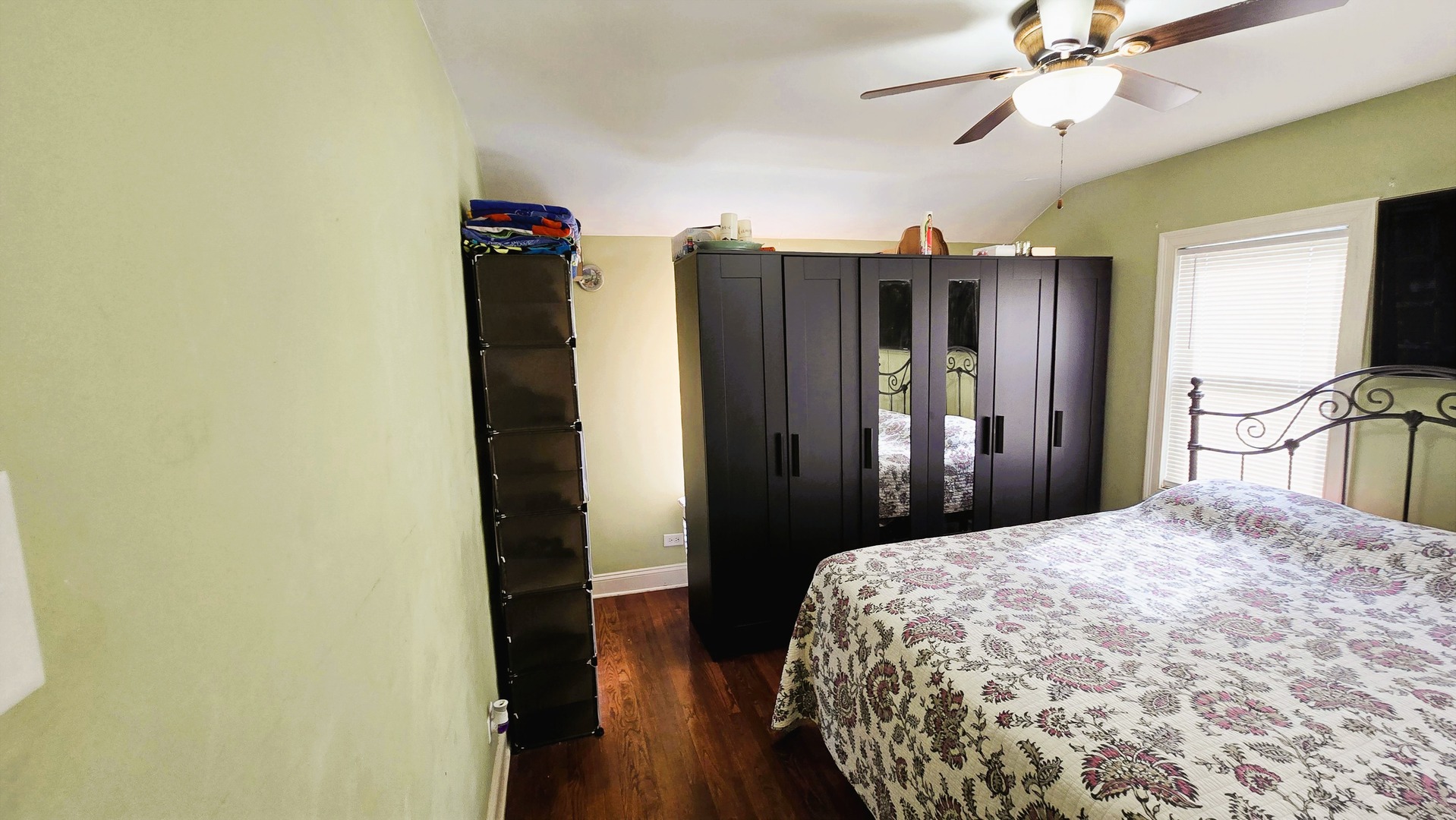 3352 West 84th Street Chicago, IL 60652 - Photo 10 of 26 a bedroom with a bed and a chandelier